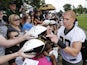 New Orleans Saints tight end Jimmy Graham signs autographs after an NFL practice session on June 4, 2013