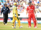England's Jonathan Trott and Australia's Matthew Wade during the ICC Champions Trophy match on June 8, 2013