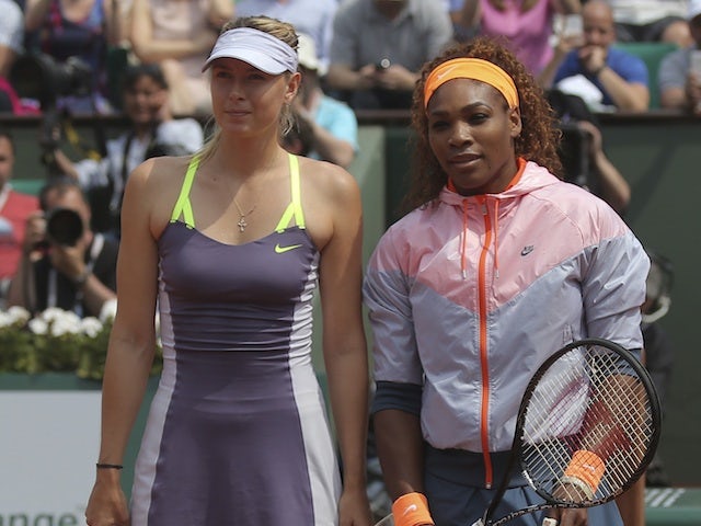 French Open finalists Maria Sharapova and Serena Williams line-up before the match on June 8, 2013