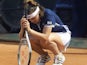 Martina Hingis looks dejected after failing to land a shot in.