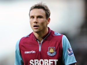 West Ham's Matt Taylor in action against Norwich on January 1, 2013