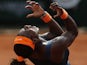 Serena Williams celebrates the final point against Maria Sharapova at the French Open final on June 8, 2013