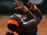 Serena Williams celebrates the final point against Maria Sharapova at the French Open final on June 8, 2013