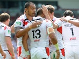 St Helens' Willie Manu is congratulated after scoring a try during the Super League match against the Bradford Bulls on June 9, 2013