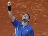 Stanislas Wawrinka celebrates a win over Richard Gasquet at the French Open on June 3, 2013
