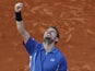 Stanislas Wawrinka celebrates a win over Richard Gasquet at the French Open on June 3, 2013