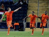 Players from the Netherlands celebrate after they scored a second goal against Russia during a UEFA European U21 Soccer Championship on June 9, 2013