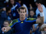 Andy Murray celebrates after beating opponent Benjamin Becker during their quarter final match at Queens on June 14, 2013