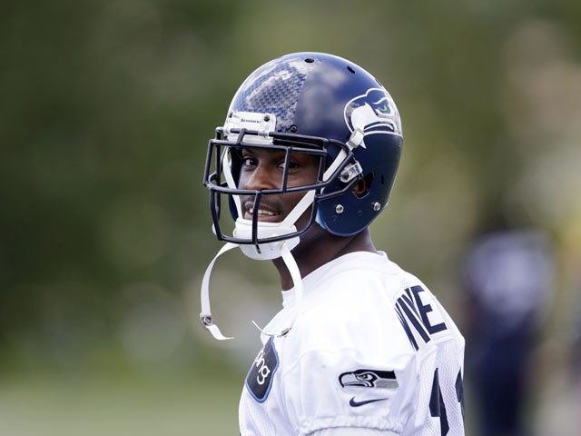 Seattle Seahawks' Antoine Winfield stands on the sidelines after a turn at scrimmage during an NFL football minicamp on June 12, 2013