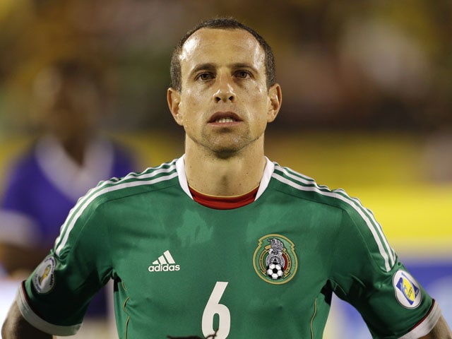 Mexico's Gerardo Torrado listens the national anthem before the start of the 2014 World Cup qualifying soccer match against Jamaica on June 4, 2013