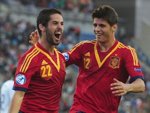 Spain top Group B with comfortable victory