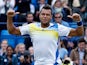 Jo-Wilfried Tsonga celebrates after beating opponent Denis Kudla during their quarter final match at Queens on June 14, 2013