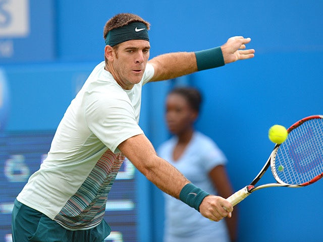 Juan Martin Del Potro in action against Xavier Malisse during the AEGON Championships at The Queen's Club on June 11, 2013