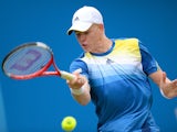 Kyle Edmund in action against Grega Zemlja during the AEGON Championships at The Queen's Club on June 11, 2013
