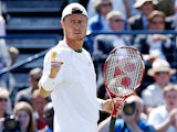 Lleyton Hewitt celebrates after beating opponent Juan Martin Del Potro during their quarter final match at Queens on June 14, 2013