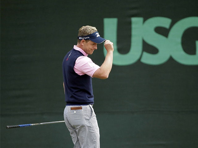 Luke Donald reacts after his birdie on the 13th hole during the second round of the US Open on June 14, 2013