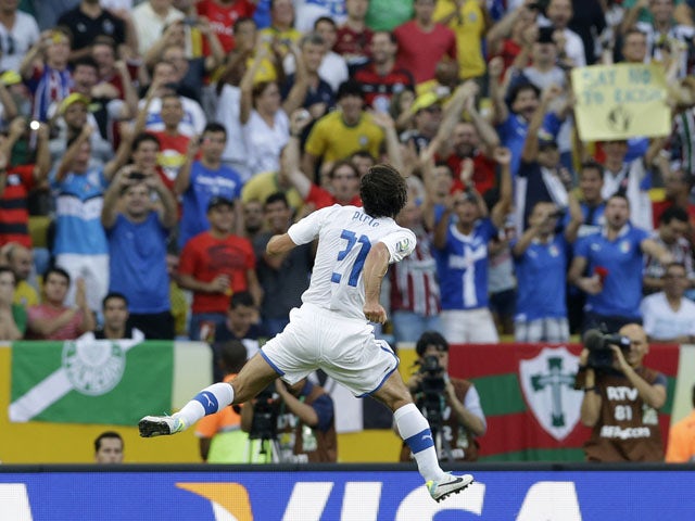 Italy's Andrea Pirlo celebrates scoring the opening goal during the soccer Confederations Cup group A match against Mexico on June 16, 2013