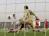Germany's Patrick Herrmann scores against Russia on June 12, 2013