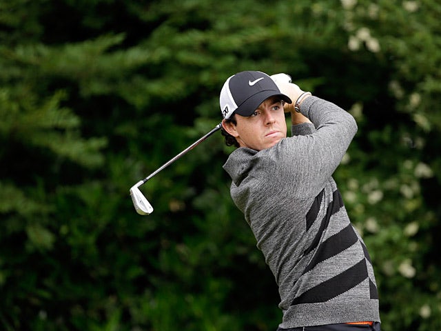 Woods, McIlroy well off the pace