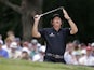 Phil Mickelson reacts to his shot from the bunker on the second hole during the fourth round of the U.S. Open golf tournament on June 16, 2013