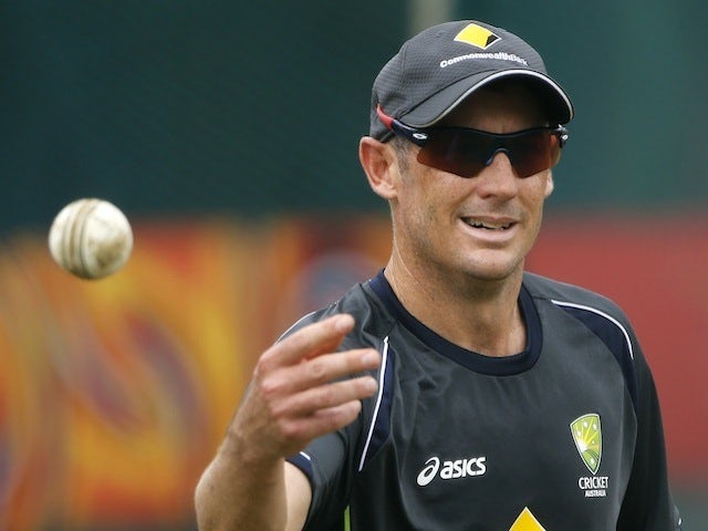 Australia's David Hussey warms up before a game with India on September 29, 2012