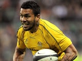 Australia's Digby Ioane in action against Barbarians on November 26, 2011