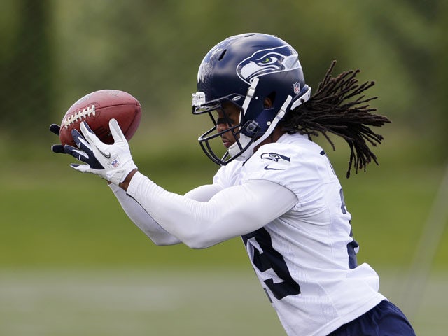 Seattle Seahawks' Earl Thomas catches a ball during an NFL football minicamp on June 12, 2013