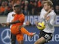Eljero Elia of The Netherlands has his shot blocked by Germany's Per Mertesacker during the friendly match on November 14, 2012
