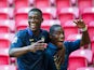 France's Geoffrey Kondogbia is congratulated by team mate Yaya Sanogo against Ghana during the Under-20 World Cup on June 21, 2013