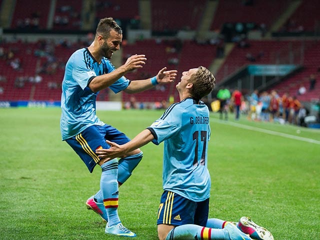 Spain's Gerard Deulofeu is congratulated by team mate Jese after scoring his team's second goal against USA during the Under-20 World Cup on June 21, 2013