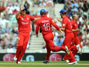 England captain Alastair Cook celebrates after a run out during the ICC Champions Trophy match against South Africa on June 19, 2013