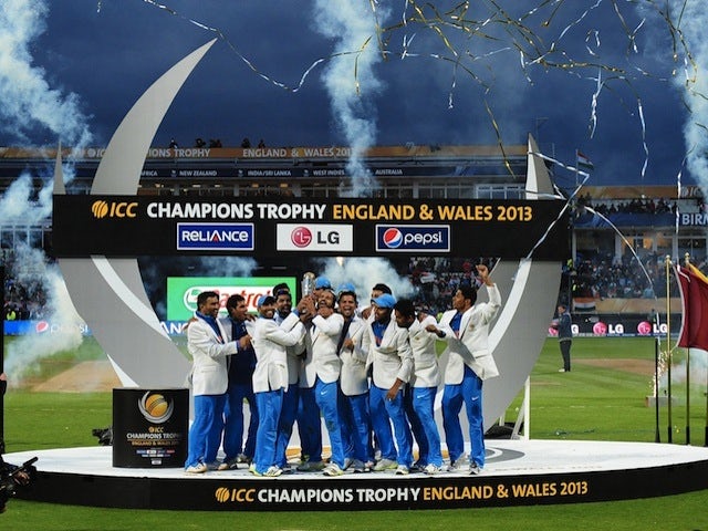 India celebrate their ICC Championship win over England on June 23, 2013