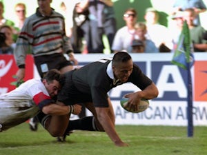 Jonah Lomu scores a try against England during the 1995 World Cup.