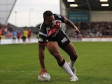 St Helen's Jordan Turner scores the opening try of the match against Salford City Reds on June 21, 2013