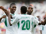 Nigeria's Nnamdi Oduamadi is congratulated by team mates after scoring his team's third against Tahiti in the Confederations Cup on June 17, 2013