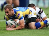 Leeds Rhinos' Rob Burrows scores a try against Widnes Vikings on June 17, 2013