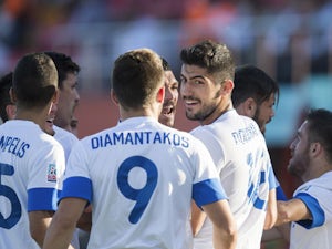 Greece's Andreas Bouchalakis celebrates scoring his side's first goal during the Under-20 World Cup match against Mexico on June 22, 2013