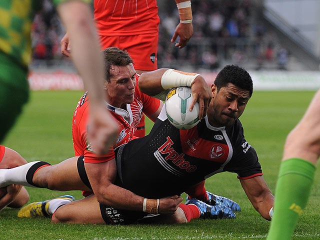 St Helen's Willie Manu scores his second try of the match against Salford City Reds on June 21, 2013