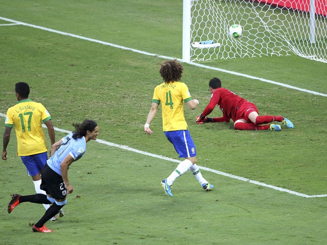 Uruguay's Edinson Cavani celebrates scoring against Brazil during their Confederations Cup semifinal on June 26, 2013