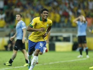 Late Paulinho goal sends Brazil to final