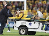 Australia's Christian Lealiifano leaves the field after he was injured during the first minute of the match against the British and Irish Lions on June 22, 2013