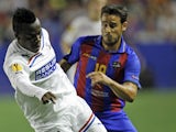 Helsingborg's David Accam is pursued by Levante's Vicente Iborra during the side's Europa League clash on September 20, 2012 