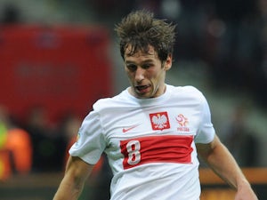 Poland's Grzegorz Krychowiak controls the ball during their World Cup Group H qualifying soccer match with England on October 17, 2013