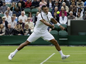 Tsonga "relaxed" after first-round win