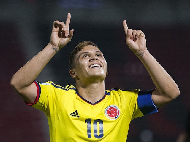 Colombia's Juan Quintero celebrates a goal against El Salvador on June 28, 2013