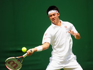 Japan's Kei Nishikori in action against Australia's Matthew Ebden during the first round of Wimbledon on June 25, 2013