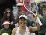Kimiko Date-Krumm of Japan reacts after defeating Alexandra Cadantu of Romania during their Women's second round singles match on June 27, 2013