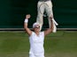 Belgium's Kirsten Flipkens celebrates after victory against Serbia's Bojana Jovanovski during day three of the Wimbledon Championships on June 26, 2013
