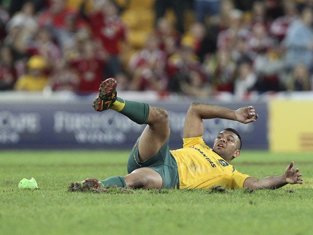 Kurtley Beale of Australia slips and falls as he fails to kick the final penalty which would have given Australia victory against the British and Irish Lions during the first rugby test match on June 22, 2013