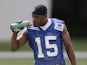 Indianapolis Colts' LaVon Brazill takes a drink of water during NFL practice on May 22, 2013